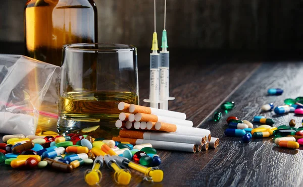 depositphotos_129604042-stock-photo-addictive-substances-including-alcohol-cigarettes